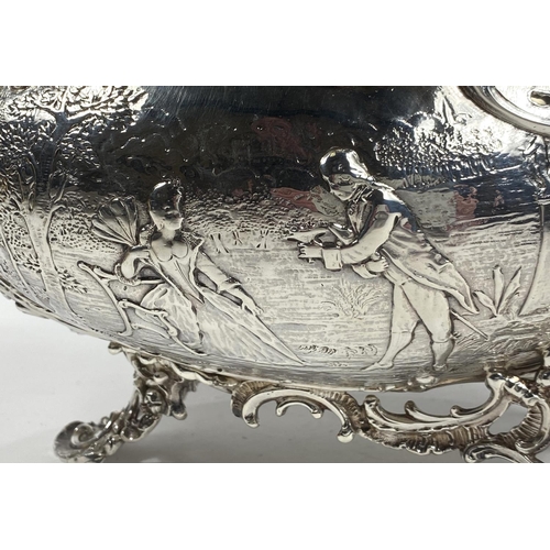 698 - A 19th century French rococo vase, boat shaped with cherub mounts to the prow and stern and extensiv... 