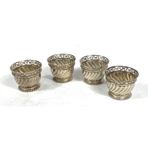 704 - A set of 4 small spiral ribbed bowls with pierced borders, London 1891, 4oz/124gm