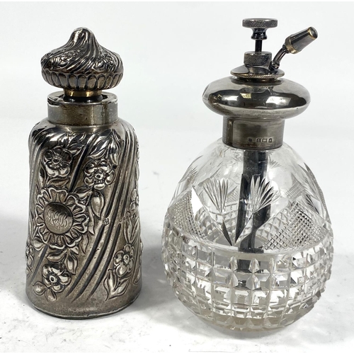 706 - A 19th century large glass scent bottle, covered with silver spiral and embossed floral stripes, Lon... 