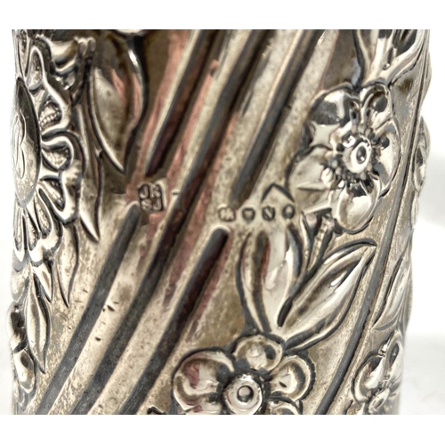 706 - A 19th century large glass scent bottle, covered with silver spiral and embossed floral stripes, Lon... 