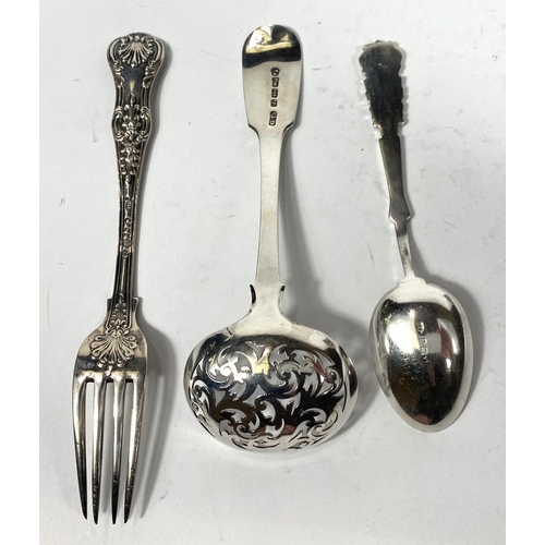 708 - A pierced sifter spoon; 4 small hallmarked silver teaspoons and a flask, various dates, 4oz; a white... 