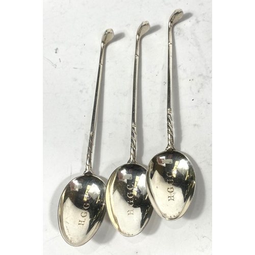 708 - A pierced sifter spoon; 4 small hallmarked silver teaspoons and a flask, various dates, 4oz; a white... 