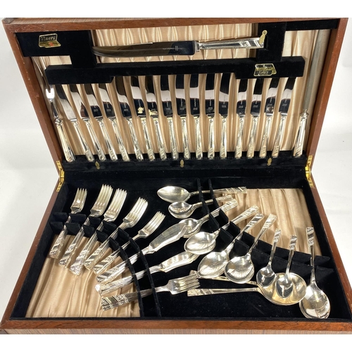 714 - A Viner's canteen of silver plated cutlery, 8 setting, in fitted mahogany table cabinet