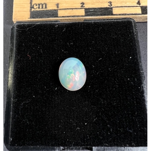 719A - An oval cabochon opal, 1.55 carat