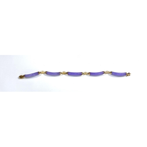 725 - A modern bracelet formed from rounded tubular amethyst coloured links, with carat hallmarked gold cl... 