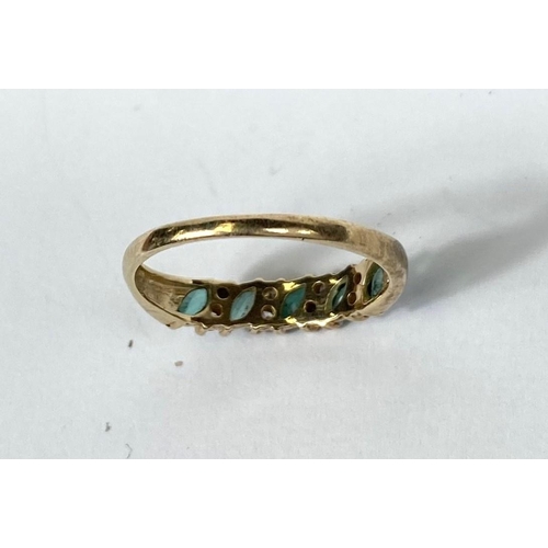 733 - A gold dress ring, hallmarks worn, set with 5 emerald coloured stones and smaller diamonds around, s... 