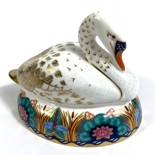 436B - Two originally boxed Royal Crown Derby paperweights, nesting Swan LIX and Fawn Collector's Guild Exc... 