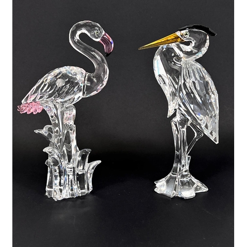 501 - A Swarovski crystal figure of a heron perched on a branch, ht 14cm: a Swarovski crystal fi... 