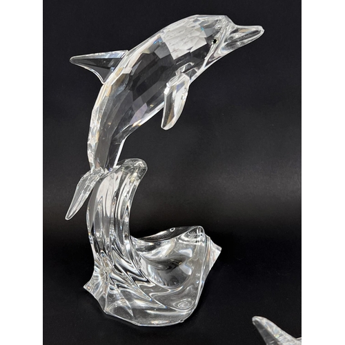 509 - A Swarovski crystal leaping dolphin, ht.20cm; A Swarovski crystal leaping OrcA