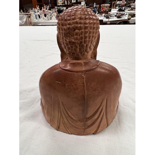 365 - A Japanese stoneware depiction of Buddha seated in lotus position height 18cm