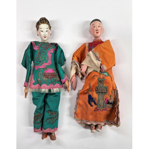 370 - 2 Chinese opera dolls in traditional clothes, painted faces with associated box height 25.5cm