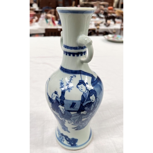 373 - A Chinese kangxi style vase depicting interior scene in blue and white 6 character marks to base hei... 