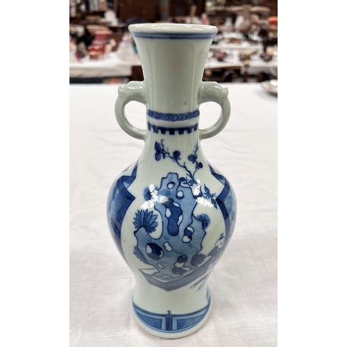 373 - A Chinese kangxi style vase depicting interior scene in blue and white 6 character marks to base hei... 