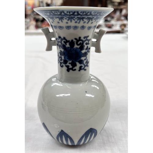 374 - A 19th century Chinese blue and white vase with double handles to flaring neck bulbous body height 1... 