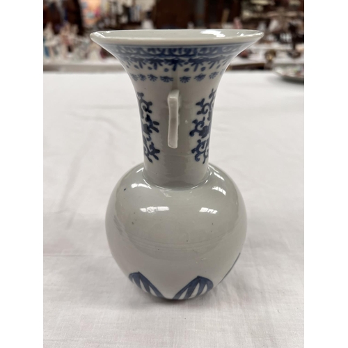 374 - A 19th century Chinese blue and white vase with double handles to flaring neck bulbous body height 1... 