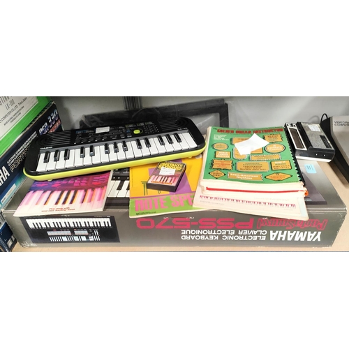 282 - A Yamaha Portasound PSS-570 electric keyboard boxed, a smaller Casio SA-46 keyboard etc