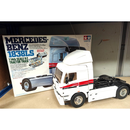 285 - A Tamiya Mercedes-Benz 1838LS 1/14th scale RC Tractor Truck, built with original box including paper... 