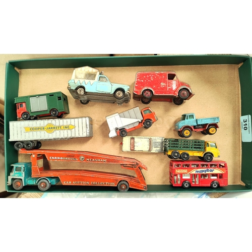 310 - A selection of vintage diecast vehicles including a Lesney vehicle carrier, Corgi Wall's Ice cream v... 