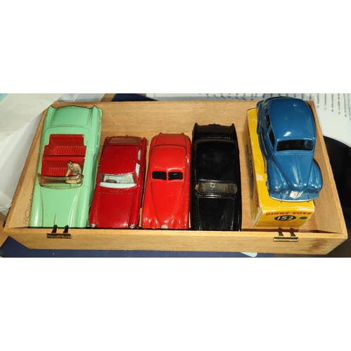 314 - Four vintage Dinky diecast vehicles 165, 132, 157 red and 152 and a Corgi MGB GT with luggage 