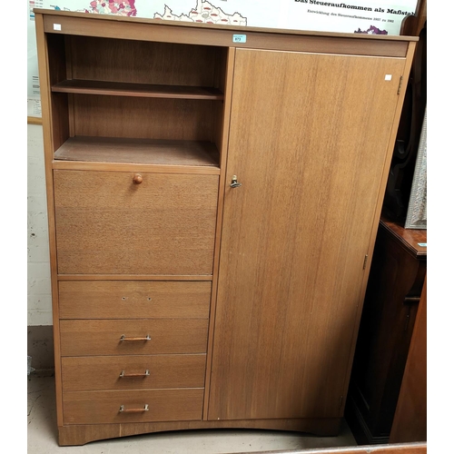 873 - A 1960's lightwood combination wardrobe