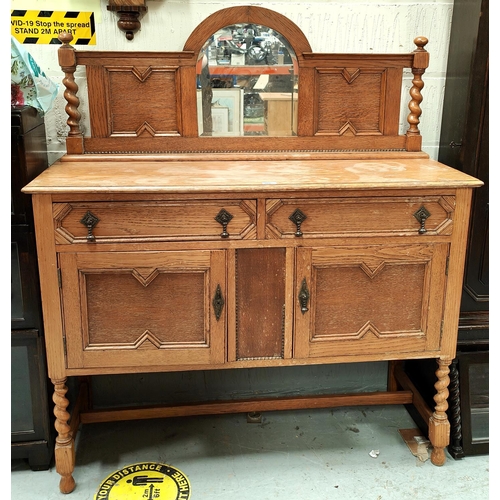 969 - A 1930's golden oak mirror back sideboard with barley twist supports, having 2 drawers and double cu... 