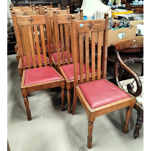 996 - A set of 9 oak ecclesiastical high rail back dining chairs with red seats and turned legs