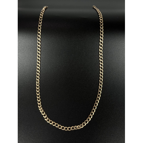 671 - A yellow metal necklace formed from flattened curb links, stamped 375, 19.25gm