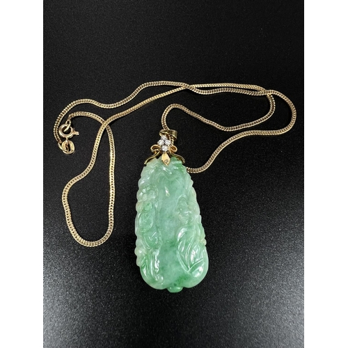 675 - A green jade coloured carved pendant set 4 diamonds, stamped '585 fine', on yellow metal chain stamp... 