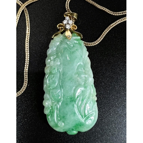 675 - A green jade coloured carved pendant set 4 diamonds, stamped '585 fine', on yellow metal chain stamp... 