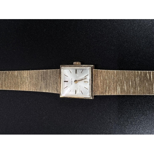 681 - A lady's Zenith wristwatch in 9 carat hallmarked gold case and integral strap, net weight 25gm