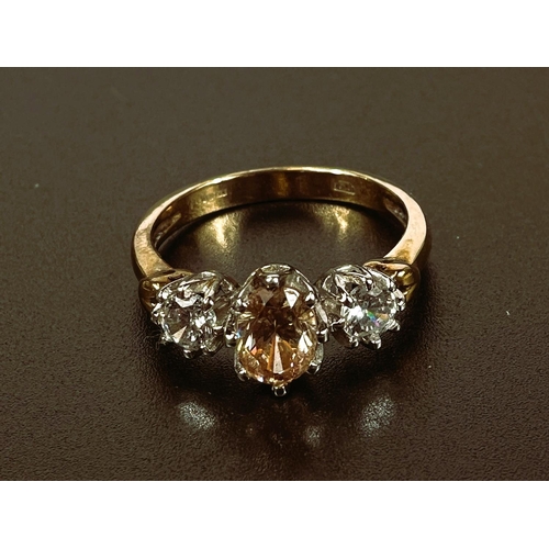 692 - A 9 carat hallmarked gold ring set central brown stone and 2 clear stones, 3.4gm, size P