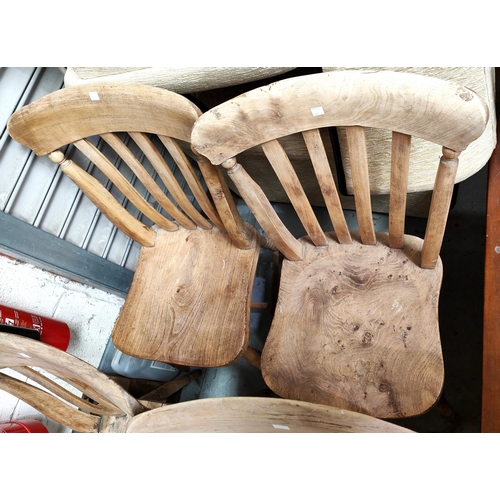 834 - A 19th century set of 6 elm and beech kitchen chairs with lath backs and solid seats