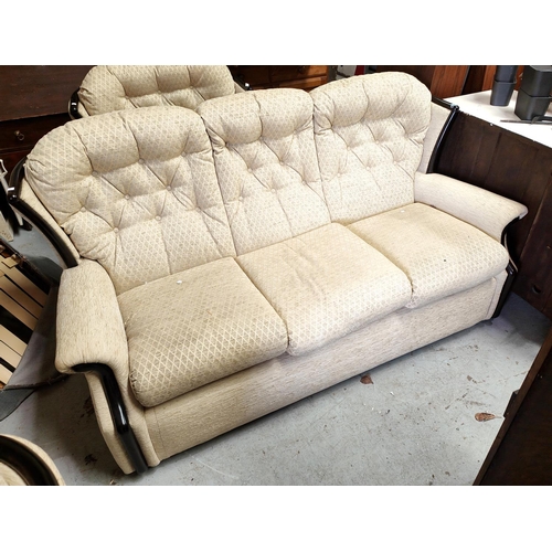 896 - A modern cream button back three piece suite with three seater settee two armchairs one reclining