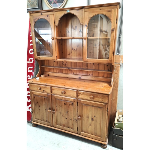 914 - A modern pine full height Welsh dresser with glazed cupboards and open shelves over 3 drawers and 3 ... 