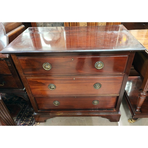 918 - A 1930's mahogany bureau with fitted interior, two shelves below on ball and claw feet; a mahogany c... 