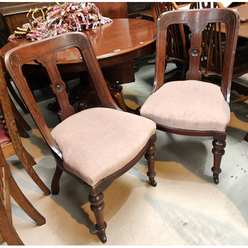 975 - A set of 4 Victorian mahogany spoon back dining chairs with floral seats