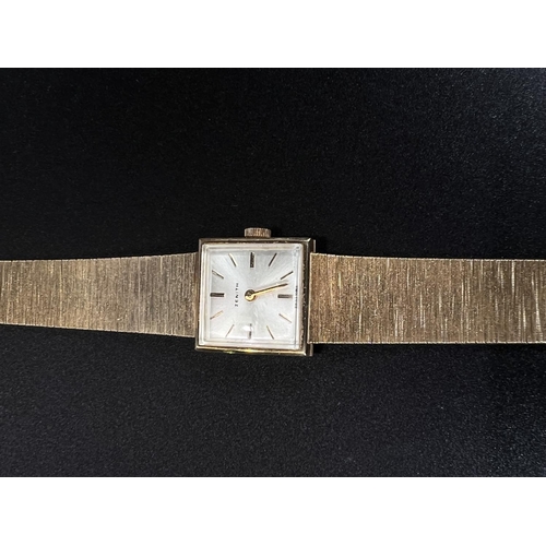 681 - A lady's Zenith wristwatch in 9 carat hallmarked gold case and integral strap, net weight 25gm