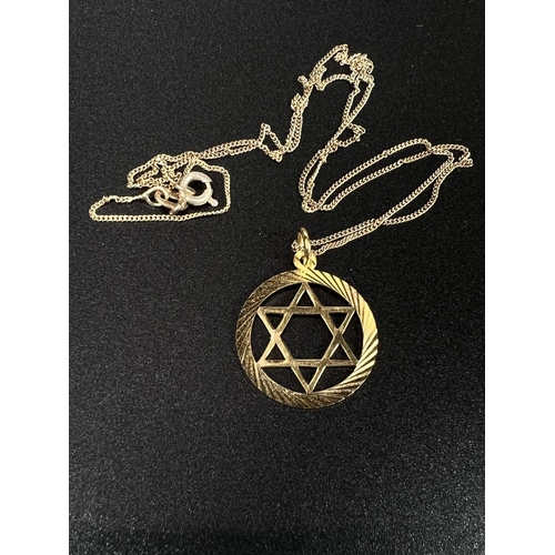 767 - A 9ct hallmarked gold Star of David pendant on a 9ct chain