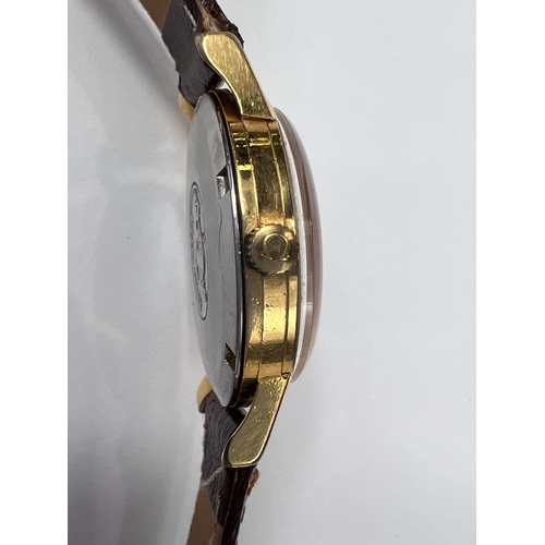 772 - A circa 1960s Omega C-Master with gilt case, swiss made movement, date aperture on later strap