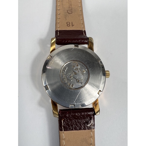 772 - A circa 1960s Omega C-Master with gilt case, swiss made movement, date aperture on later strap