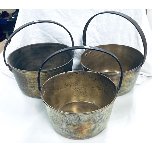 100 - Three large brass jam pans diameters 33cm, 30cm and 29cm