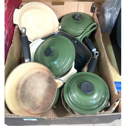 101 - A selection of Le Creuset dark green coloured pans 