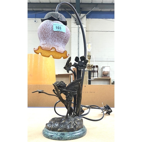 103 - A bronze table lamp with fairly figure in flowers, the shade of flower head form, signature to the b... 