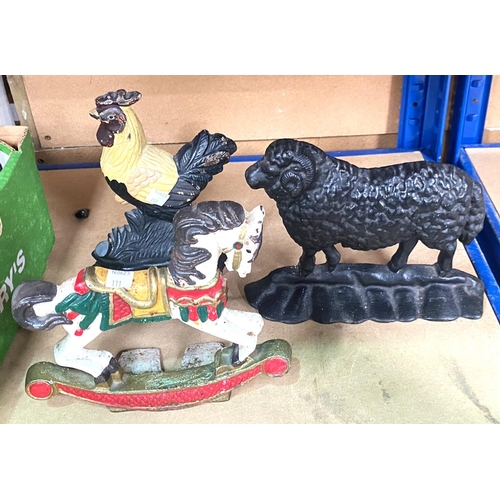 111 - Three Victorian cast iron doorstops:  sheep; carousel horse & cockerel; a Royal Artillery m... 