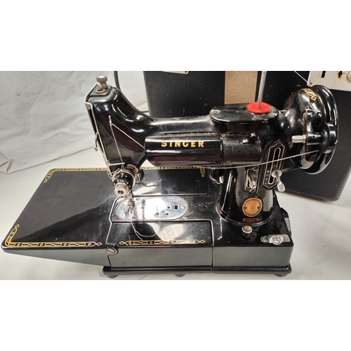 118 - A Singer 222K electric sewing machine in original box (sold as a collectors item only)