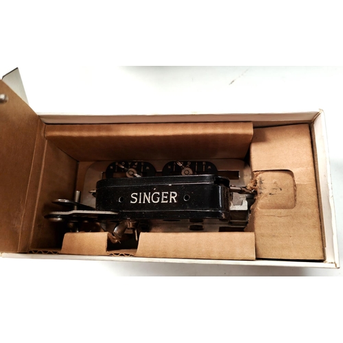 118 - A Singer 222K electric sewing machine in original box (sold as a collectors item only)