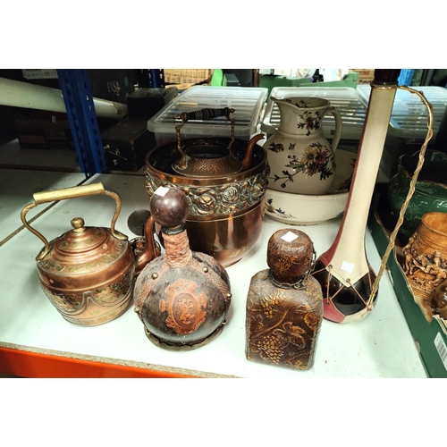 122A - A selection of copper and brassware including jardiniere, kettle etc.; leather covered bottles etc.