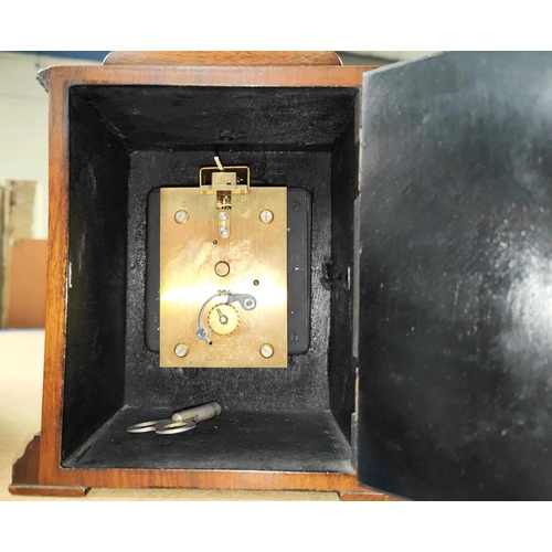 123 - A small Georgian style walnut cased bracket clock