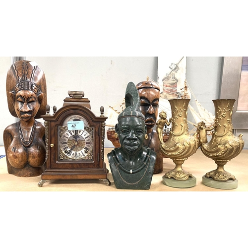 47 - A reproduction bracket clock; a 19th century pair of gilt metal vases with cherub mounts; 2 African ... 