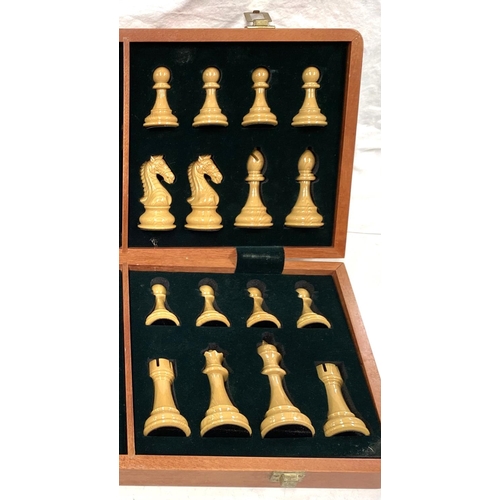 49B - A Kasporov chess set with large pieces cased inside board